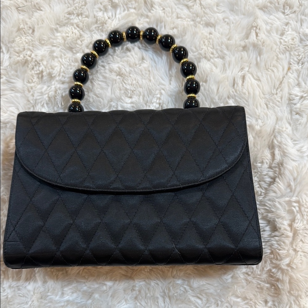 Elegant Black Quilted Shoulder Bag with Beaded Handle